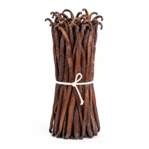 A bundle of long, wrinkled brown vanilla beans tied with twine on a white background.